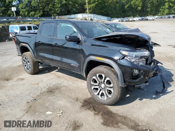 2024 GMC Canyon 4WD AT4 with VIN 1GTP6DEK2R1180037, listed as a Copart auction lot 71637264 with 7,565 mi miles and Salvage Title. Bid and sale history available at carsss.com. Image 4.