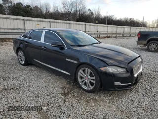 2016 Jaguar XJ Portfolio with VIN SAJWA2G71G8V95573, listed as a Copart auction lot 85975594 with 82,221 mi miles and Salvage title. Bid and sale history available at DreamBid. Image 4.