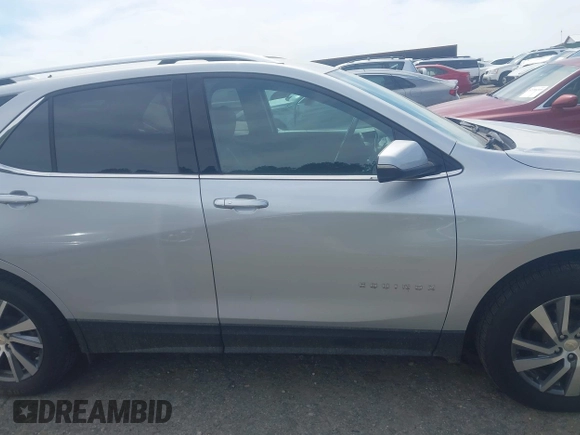 2022 Chevrolet Equinox Premier z VIN 2GNAXXEVXN6146327, wystawiony jako IAAI lot #42294870 z przebiegiem 68 276 mil mil oraz . Historia ofert i sprzedaży dostępna na DreamBid. Obrazek 13.
