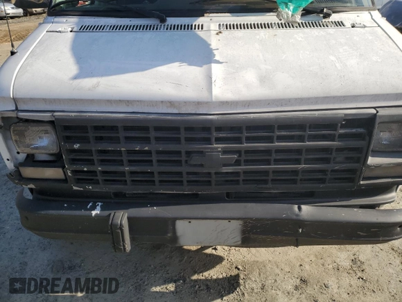 1995 Chevrolet Chevy Van z VIN 1GCEG25Z1SF202088, wystawiony jako Copart lot #44373315 z przebiegiem 184 821 mil mil oraz Szkoda całkowita • Salvage title. Historia ofert i sprzedaży dostępna na DreamBid. Obrazek 12.