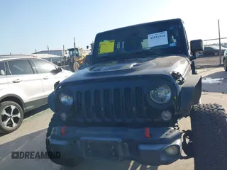 2015 Jeep Wrangler Unlimited Rubicon Hard Rock with VIN 1C4HJWFG7FL602344, listed as a IAAI auction lot 42011914 with 109,238 mi miles and . Bid and sale history available at DreamBid. Image 12.