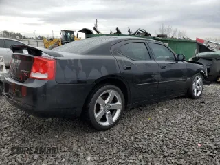 2010 Dodge Charger R/T with VIN 2B3CA5CT3AH172325, listed as a Copart auction lot 50302885 with 257,870 mi miles and Salvage Title. Bid and sale history available at carsss.com. Image 3.