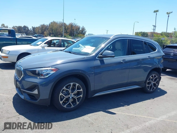 2021 BMW X1 sDrive28i z VIN WBXJG7C02M5T37169, wystawiony jako IAAI lot #42226396 z przebiegiem 48 603 mil mil oraz . Historia ofert i sprzedaży dostępna na DreamBid. Obrazek 15.