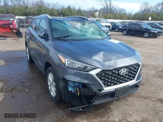 2019 Hyundai Tucson Value with VIN KM8J33A40KU999340, listed as a IAAI auction lot 41876380 with 52,752 mi miles. Bid and sale history available at carsss.com. Image 1.