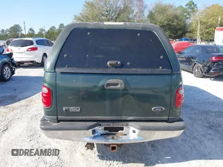2003 Ford F-150 XLT with VIN 1FTRW07L53KA64064, listed as a IAAI auction lot 41697350 with 227,114 mi miles. Bid and sale history available at carsss.com. Image 16.