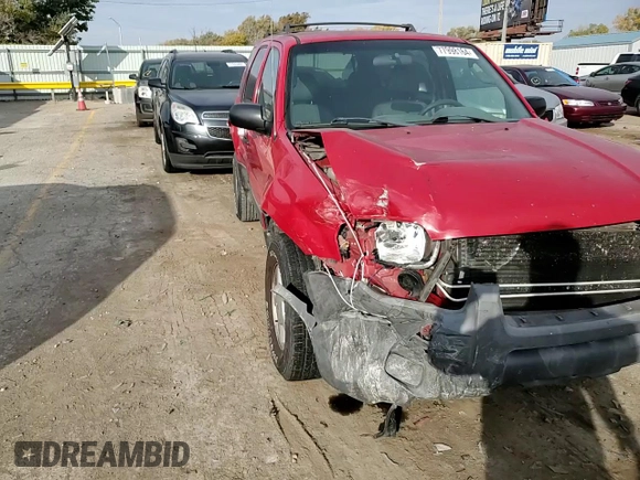 2002 Ford Escape XLS Value with VIN 1FMYU01B82KC15443, listed as a Copart auction lot 77998164 with 212,313 mi miles and Salvage title. Bid and sale history available at DreamBid. Image 12.