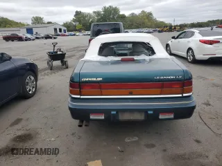 1994 Chrysler LeBaron z VIN 1C3EU4530RF189347, wystawiony jako Copart lot #72474654 z przebiegiem 38 868 mil mil oraz Tytuł czysty. Historia ofert i sprzedaży dostępna na DreamBid. Obrazek 6.