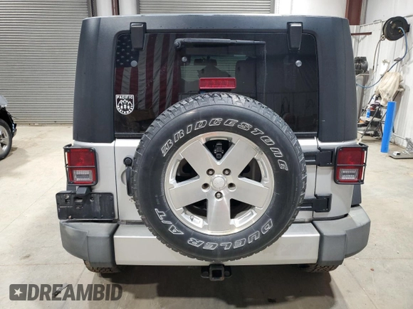 2008 Jeep Wrangler Unlimited Sahara with VIN 1J4GA59148L652001, listed as a Copart auction lot 48599655 with 161,436 mi miles and Clean title. Bid and sale history available at DreamBid. Image 6.