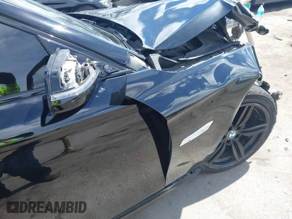 2014 BMW 5 Series 535i with VIN WBA5B1C58ED481934, listed as a IAAI auction lot 41793504 with 190,773 mi miles and . Bid and sale history available at DreamBid. Image 20.