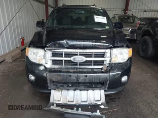 2009 Ford Escape Limited z VIN 1FMCU04G29KA59623, wystawiony jako IAAI lot #42428300 z przebiegiem 115 915 mil mil oraz . Historia ofert i sprzedaży dostępna na DreamBid. Obrazek 12.