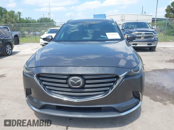 2016 Mazda CX-9 Signature with VIN JM3TCBEY9G0100579, listed as a IAAI auction lot 42282293 with 142,700 mi miles and . Bid and sale history available at DreamBid. Image 6.
