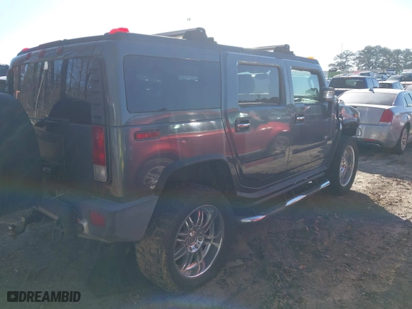 2008 Hummer H2 SUV with VIN 5GRGN23878H109547, listed as a IAAI auction lot 41648526 with 181,692 mi miles. Bid and sale history available at carsss.com. Image 4.