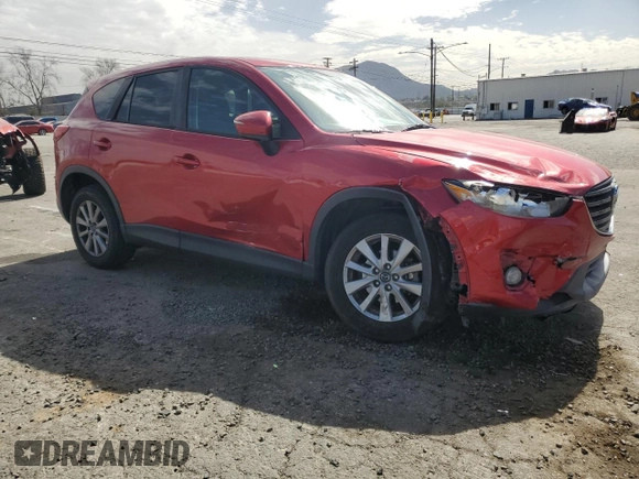 2016 Mazda CX-5 Touring with VIN JM3KE2CY9G0807478, listed as a Copart auction lot 47393775 with 105,034 mi miles and Salvage Title. Bid and sale history available at carsss.com. Image 4.