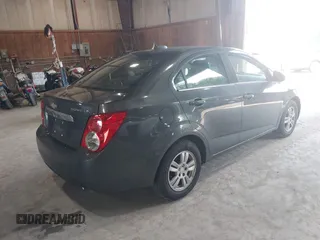 2016 Chevrolet Sonic LT z VIN 1G1JC5SH0G4170981, wystawiony jako IAAI lot #42576425 z przebiegiem 169 102 mil mil oraz . Historia ofert i sprzedaży dostępna na DreamBid. Obrazek 4.