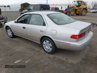 2001 Toyota Camry CE with VIN 4T1BG22K51U046766, listed as a IAAI auction lot 41674202 with 148,581 mi miles. Bid and sale history available at carsss.com. Image 3.