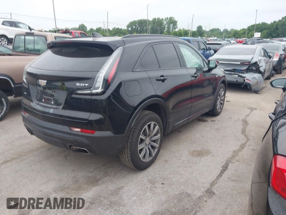 2019 Cadillac XT4 AWD Sport z VIN 1GYFZFR48KF197731, wystawiony jako IAAI lot #42668639 z przebiegiem 73 170 mil mil oraz . Historia ofert i sprzedaży dostępna na DreamBid. Obrazek 4.