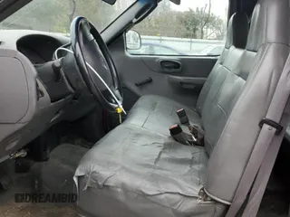 2003 Ford F-150 XL with VIN 1FTRX17W43NB33905, listed as a Copart auction lot 44441035 with 185,898 mi miles and Salvage Title. Bid and sale history available at carsss.com. Image 7.