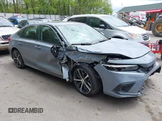 2024 Honda Civic Touring with VIN 2HGFE1F94RH338020, listed as a IAAI auction lot 42225809 with Not provided miles and . Bid and sale history available at DreamBid. Image 1.
