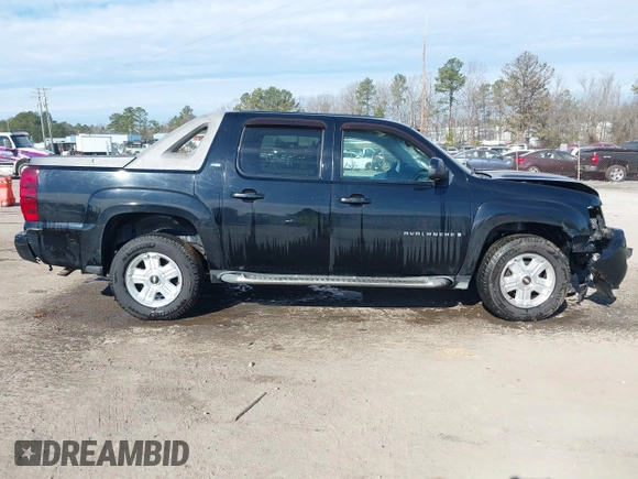 2009 Chevrolet Avalanche 2LT z VIN 3GNFK22079G191901, wystawiony jako IAAI lot #41641130 z przebiegiem 187 892 mil mil oraz . Historia ofert i sprzedaży dostępna na DreamBid. Obrazek 13.
