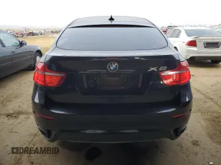 2011 BMW X6 50i with VIN 5UXFG8C56BLZ96125, listed as a Copart auction lot 84271244 with 69,732 mi miles and Salvage Title. Bid and sale history available at carsss.com. Image 6.