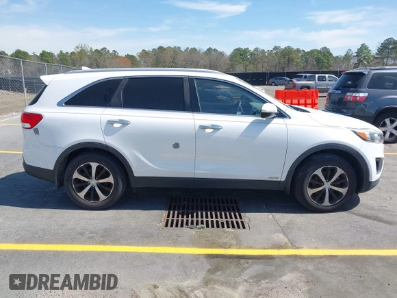2016 Kia Sorento EX with VIN 5XYPHDA15GG132956, listed as a IAAI auction lot 41845289 with 112,311 mi miles and . Bid and sale history available at DreamBid. Image 13.
