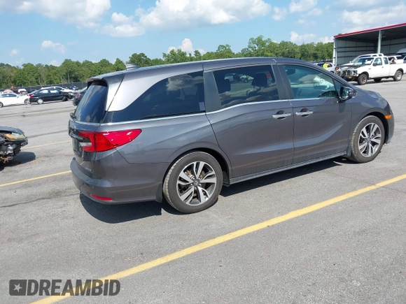 2022 Honda Odyssey Touring с VIN 5FNRL6H86NB026316, выставлен на аукционе IAAI как лот 42611106 с пробегом 75 427 миль миль и . История ставок и продаж доступна на DreamBid. Изображение 4.