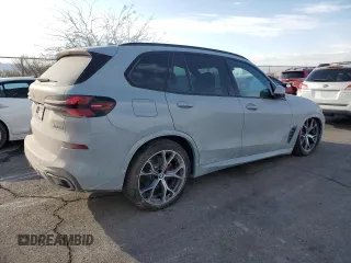 2025 BMW X5 sDrive40i with VIN 5UX13EU09S9X71671, listed as a Copart auction lot 42515055 with 2,695 mi miles and Salvage Title. Bid and sale history available at carsss.com. Image 3.