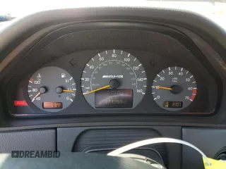 2000 Mercedes-Benz E with VIN WDBJF74J7YB055624, listed as a Copart auction lot 63880184 with 71,355 mi miles and Salvage Title. Bid and sale history available at DreamBid. Image 9.