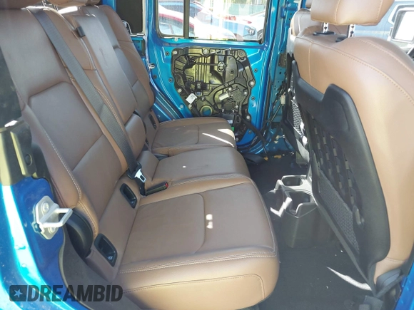2023 Jeep Gladiator Rubicon with VIN 1C6JJTBG3PL581023, listed as a IAAI auction lot 41963931 with 15,023 mi miles and . Bid and sale history available at DreamBid. Image 8.