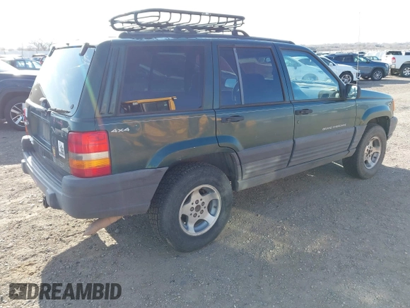 1998 Jeep Grand Cherokee Laredo with VIN 1J4GZ58S5WC362365, listed as a IAAI auction lot 41891397 with 246,673 mi miles. Bid and sale history available at carsss.com. Image 4.
