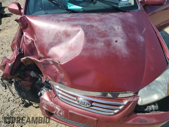 2007 Kia Spectra EX z VIN KNAFE121275436205, wystawiony jako Copart lot #57680055 z przebiegiem 141 670 mil mil oraz Szkoda całkowita • Salvage title. Historia ofert i sprzedaży dostępna na DreamBid. Obrazek 11.