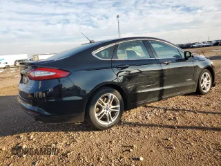 2016 Ford Fusion Titanium Hybrid with VIN 3FA6P0RU6GR356609, listed as a Copart auction lot 79803204 with 69,619 mi miles and Salvage Title. Bid and sale history available at carsss.com. Image 3.