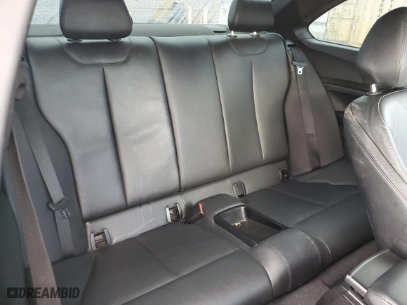 2014 BMW 2 Series M235i with VIN WBA1J7C55EVW84665, listed as a Copart auction lot 44257115 with 111,461 mi miles and Salvage Title. Bid and sale history available at carsss.com. Image 10.