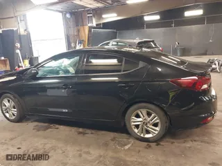2019 Hyundai Elantra SEL with VIN 5NPD84LF1KH467449, listed as a IAAI auction lot 41693597 with 76,959 mi miles. Bid and sale history available at carsss.com. Image 13.
