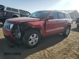 2011 Jeep Grand Cherokee Laredo z VIN 1J4RR4GG1BC703349, wystawiony jako Copart lot #56818875 z przebiegiem 211 523 mil mil oraz Szkoda całkowita • Salvage title. Historia ofert i sprzedaży dostępna na DreamBid. Obrazek 1.