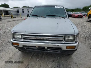 1989 Toyota Pickup DX z VIN JT4RN81PXK0034338, wystawiony jako Copart lot #58797935 z przebiegiem 210 495 mil mil oraz Tytuł czysty. Historia ofert i sprzedaży dostępna na DreamBid. Obrazek 5.