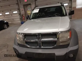 2007 Dodge Nitro SXT with VIN 1D8GU28K47W569317, listed as a IAAI auction lot 41740052 with 220,265 mi miles. Bid and sale history available at carsss.com. Image 12.