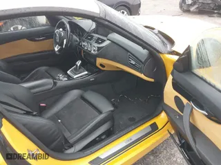 2011 BMW Z4 sDrive35i with VIN WBALM7C58BE383383, listed as a IAAI auction lot 41381714 with NaN miles. Bid and sale history available at carsss.com. Image 5.