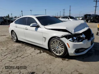 2015 BMW 4 Series 428i with VIN WBA4A9C58FGL85220, listed as a Copart auction lot 57128265 with 115,257 mi miles and Salvage title. Bid and sale history available at DreamBid. Image 4.