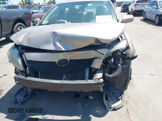 2009 Toyota Corolla with VIN 2T1BU40E09C185833, listed as a IAAI auction lot 41985654 with 138,637 mi miles. Bid and sale history available at carsss.com. Image 6.