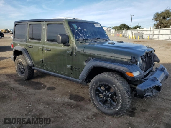 2021 Jeep Wrangler Unlimited Willys with VIN 1C4HJXDM0MW655574, listed as a Copart auction lot 82288524 with 34,986 mi miles and Salvage title. Bid and sale history available at DreamBid. Image 4.