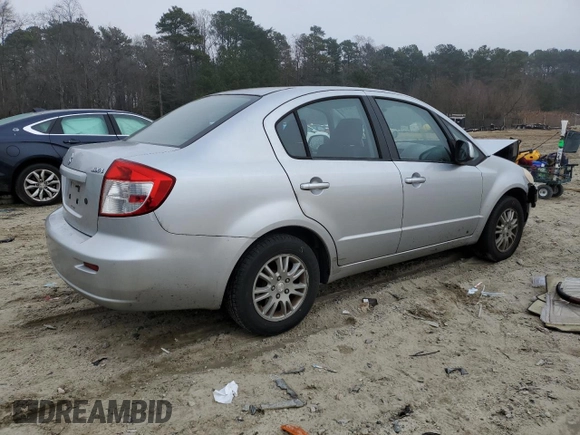 2012 Suzuki SX4 LE with VIN JS2YC5A39C6305357, listed as a Copart auction lot 84146324 with 163,097 mi miles and Salvage Title. Bid and sale history available at carsss.com. Image 3.