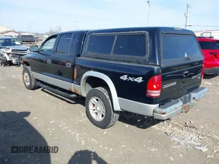 2004 Dodge Dakota SLT with VIN 1D7HG48N54S734087, listed as a IAAI auction lot 41770151 with 129,514 mi miles. Bid and sale history available at carsss.com. Image 3.