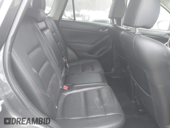 2013 Mazda CX-5 Grand Touring with VIN JM3KE4DE2D0164225, listed as a IAAI auction lot 41663412 with 162,738 mi miles. Bid and sale history available at carsss.com. Image 8.