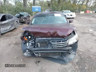 2014 Volkswagen Passat SEL Premium with VIN 1VWCS7A37EC022413, listed as a IAAI auction lot 40597042 with 131,866 mi miles. Bid and sale history available at carsss.com. Image 13.