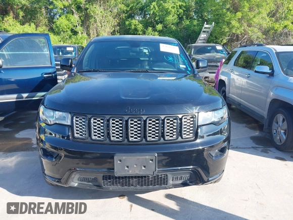2017 Jeep Grand Cherokee Laredo with VIN 1C4RJFAGXHC817666, listed as a IAAI auction lot 42036817 with 119,698 mi miles. Bid and sale history available at carsss.com. Image 12.