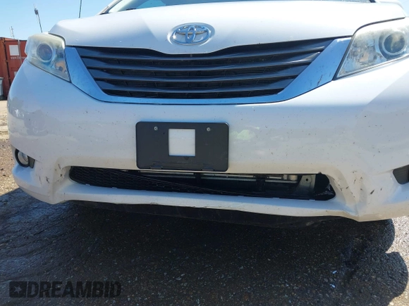 2014 Toyota Sienna XLE z VIN 5TDYK3DC7ES431782, wystawiony jako IAAI lot #41975182 z przebiegiem 191 870 mil mil oraz . Historia ofert i sprzedaży dostępna na DreamBid. Obrazek 19.