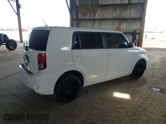 2012 Scion xB with VIN JTLZE4FE2CJ028761, listed as a Copart auction lot 53379165 with 131,758 mi miles and Salvage Title. Bid and sale history available at DreamBid. Image 3.