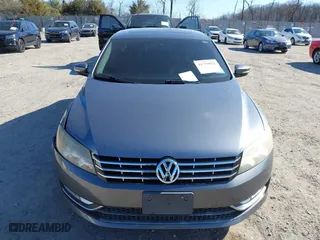 2013 Volkswagen Passat SE w/Sunroof with VIN 1VWBM7A30DC125919, listed as a IAAI auction lot 41759051 with 112,952 mi miles. Bid and sale history available at carsss.com. Image 12.