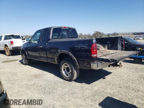 2000 Ford F-150 XL with VIN 1FTRX18W0YKB06899, listed as a Copart auction lot 46170175 with 252,042 mi miles and Salvage Title. Bid and sale history available at carsss.com. Image 2.